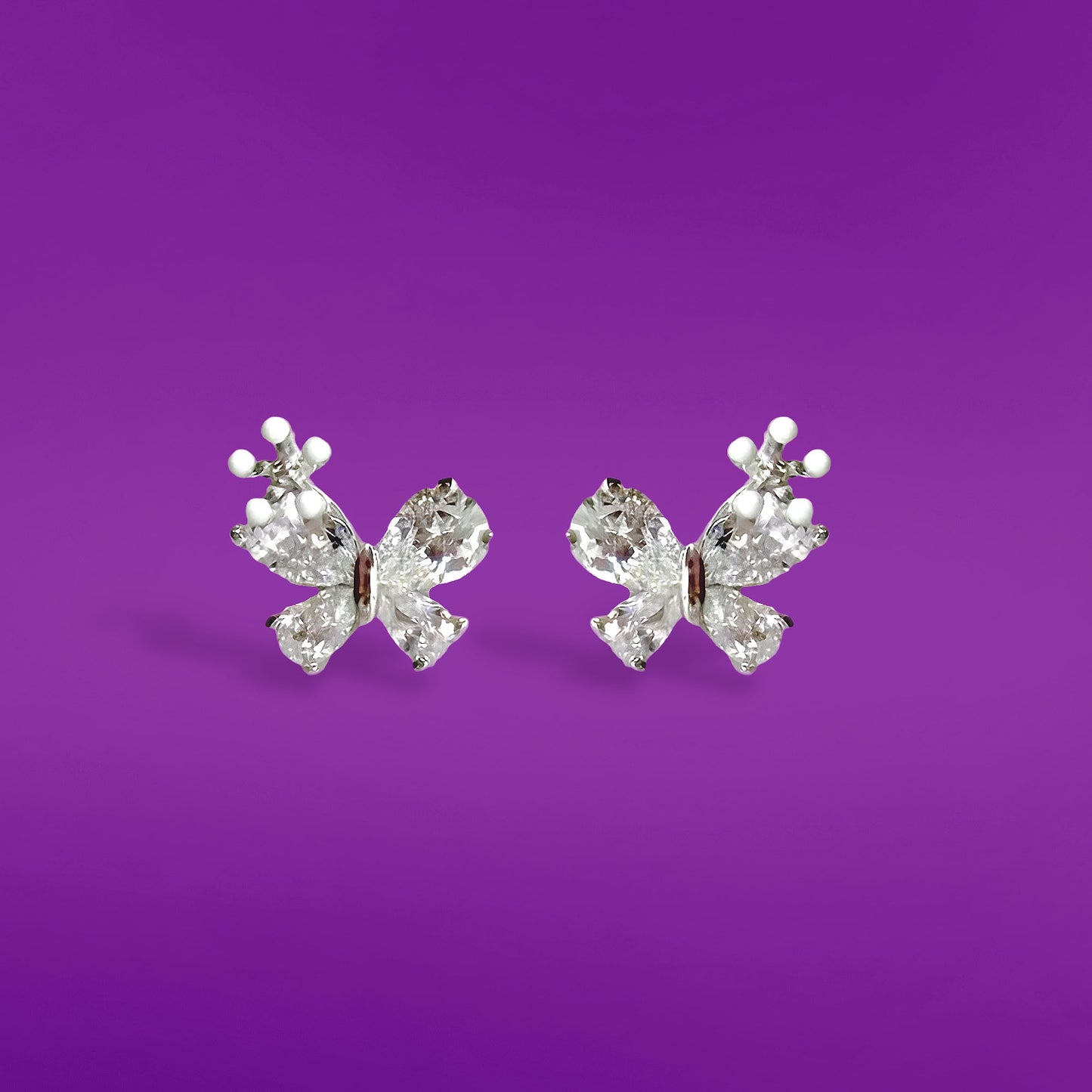 aura butterfly diamond studs