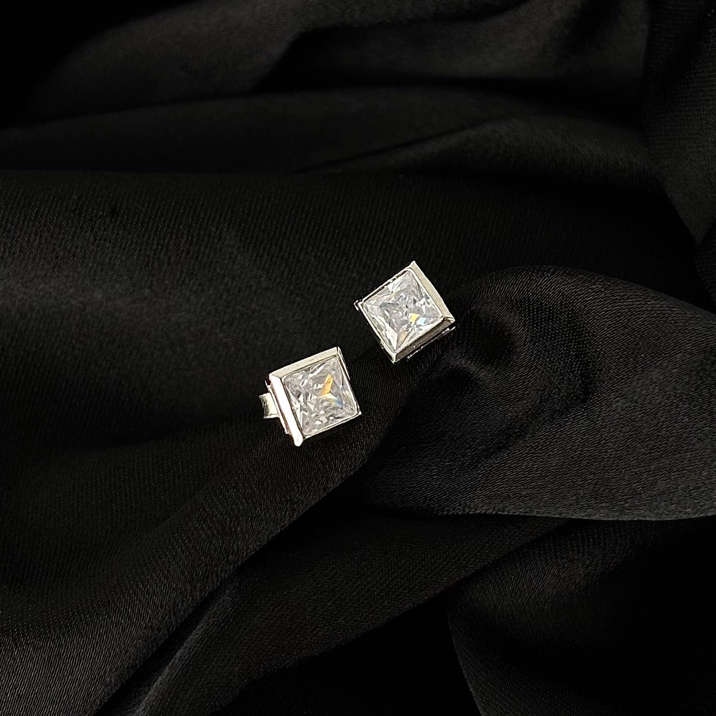 lustrous square studs